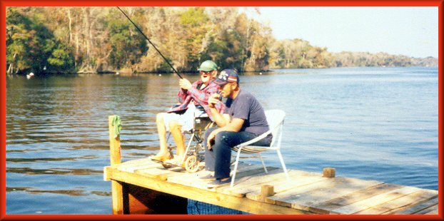 Daddy and Kenneth on the river