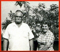 an old black and white photo of mama and daddy